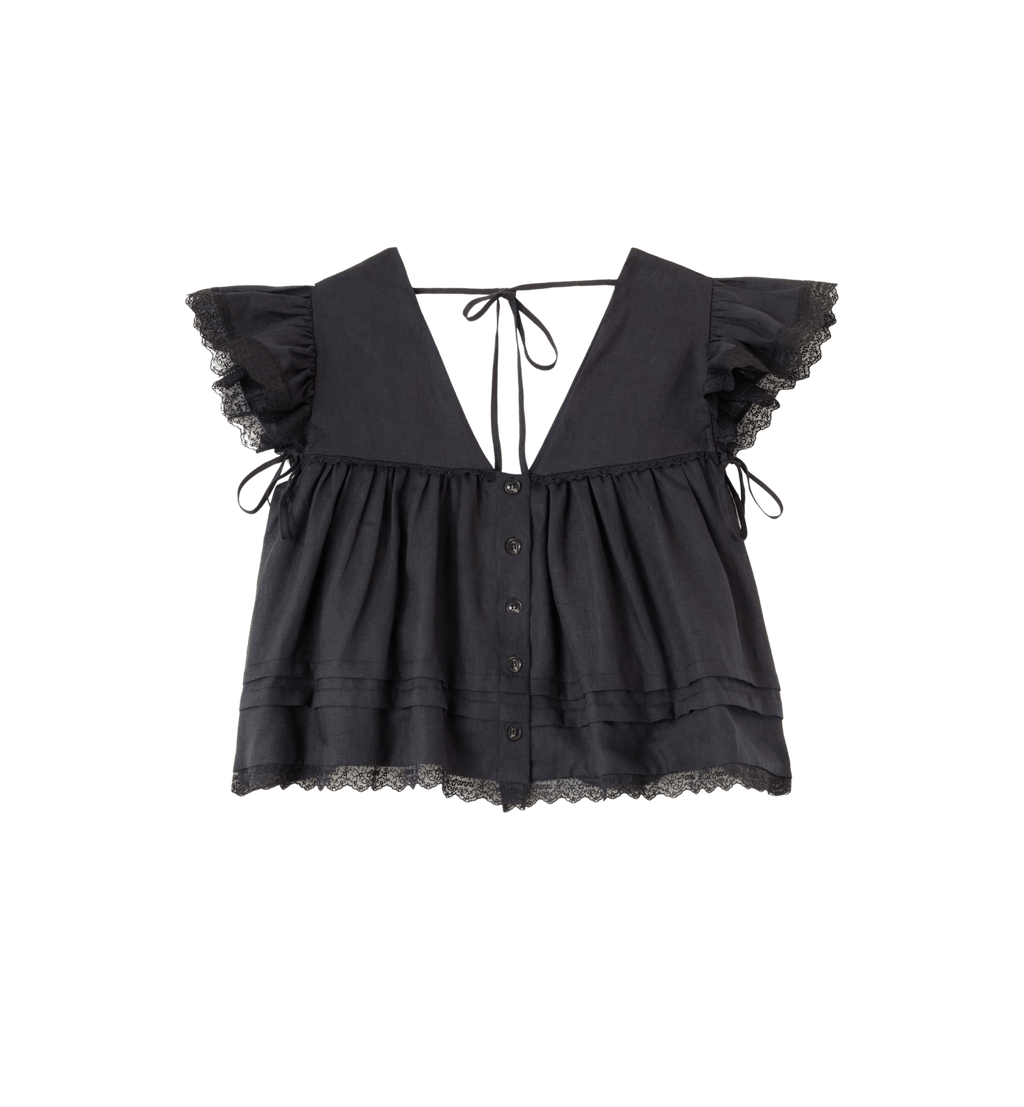 Blusa GANNI con mangas tipo ángel