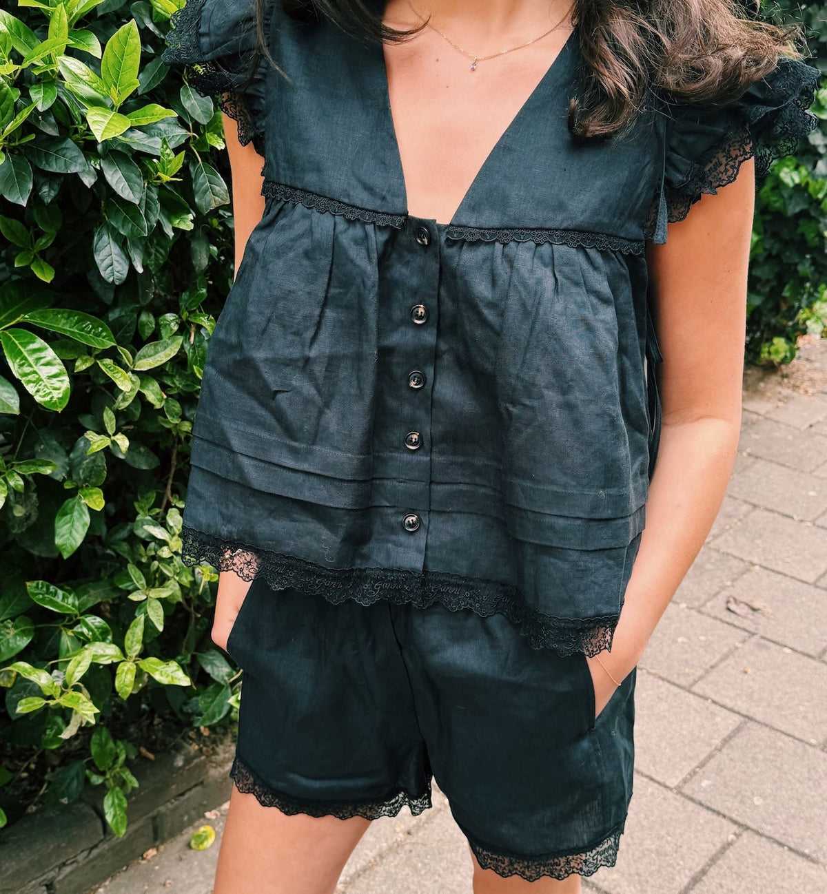 Blusa GANNI con mangas tipo ángel